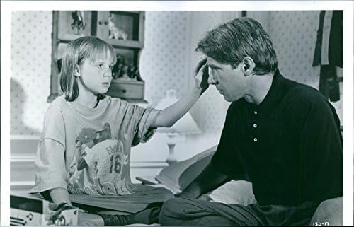 Fotografie de epocă a lui Harrison Ford și Mikki Allen, în ceea ce privește Henry.